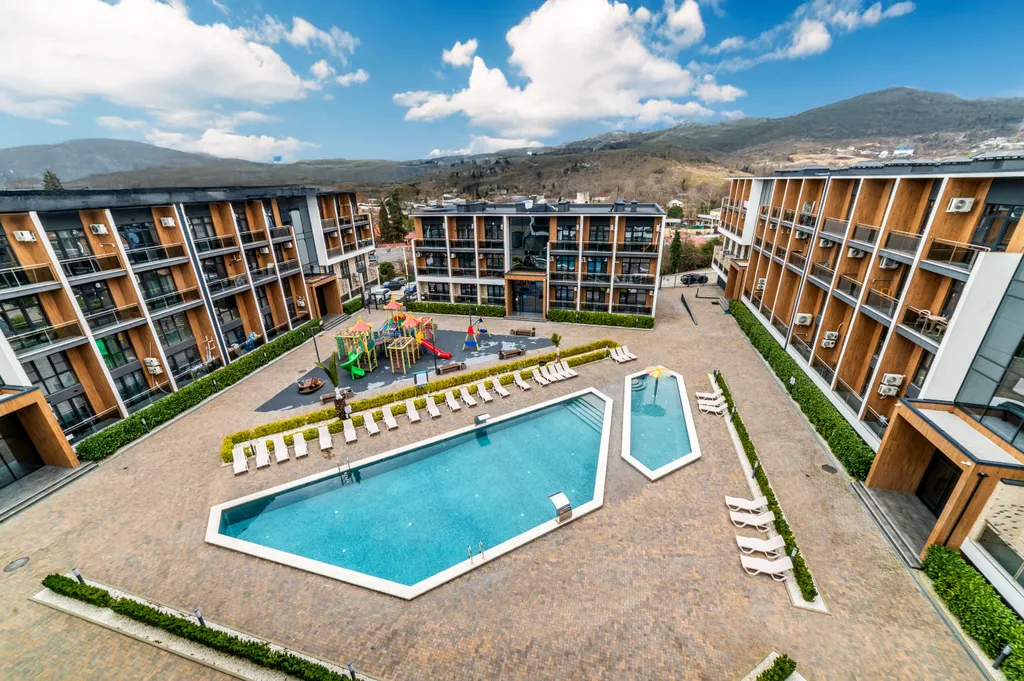 Двухуровневый апартамент около моря с бассейном в ЖК Морской квартал