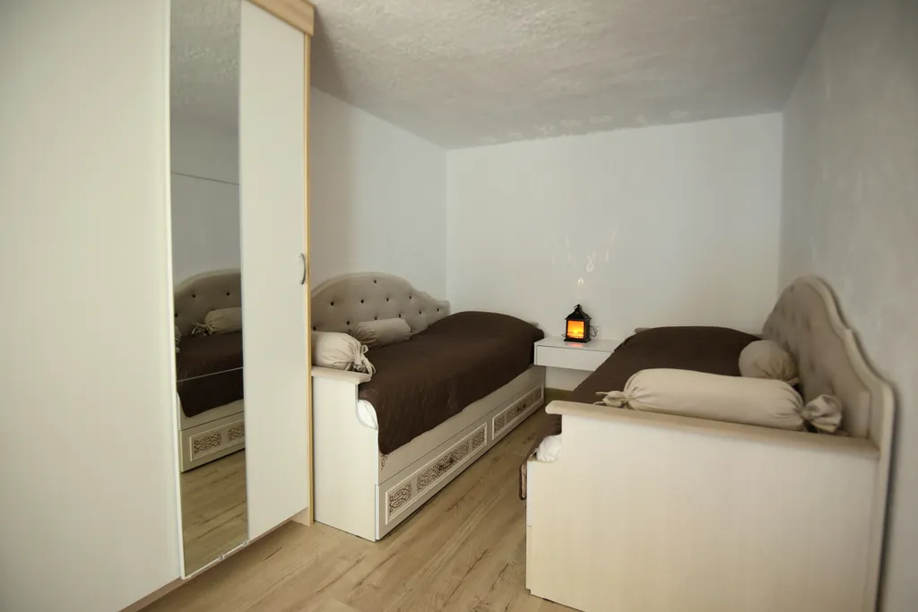 Комфортный двухуровневый апартамент в элитном комплексе Колизей