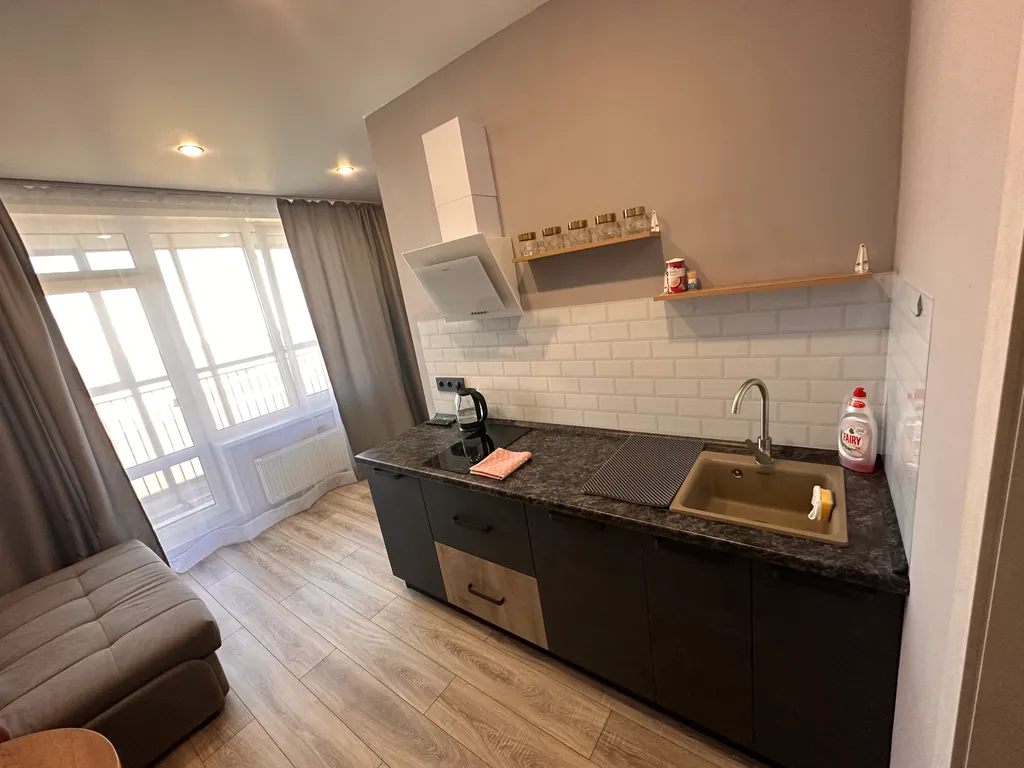 Уютная студия с видом на город