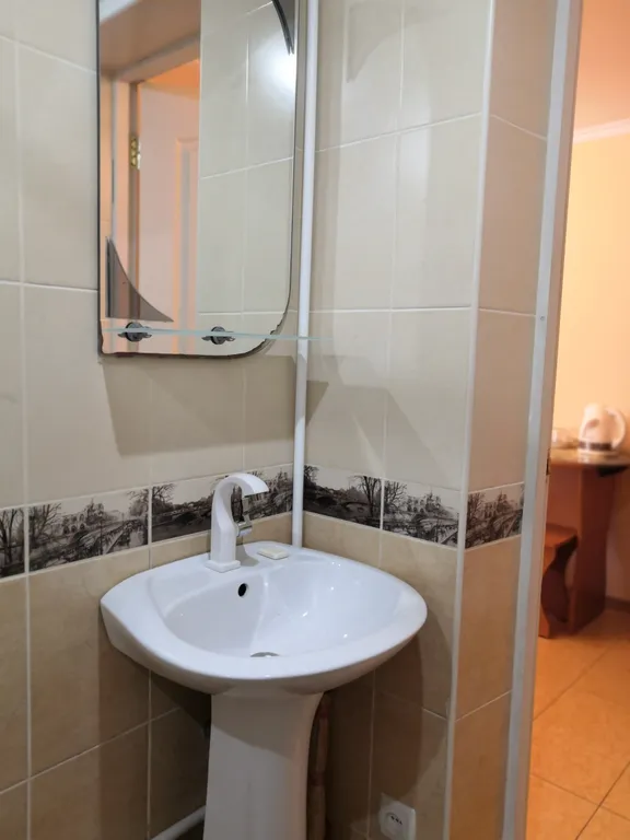 Уютный номер в коттедже в центре города.