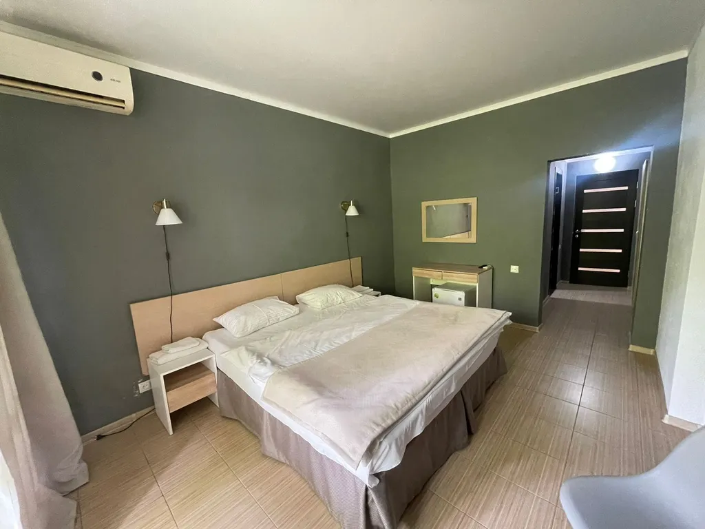 Квартира Квартира Уютный номер на 1 этаже с видом на парк с балконом. — Гагра