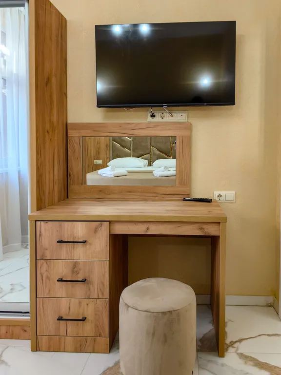 Апартаменты с отдельной спальней и кухней - гостиной