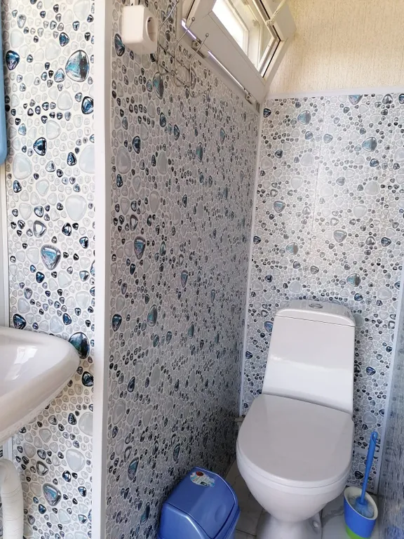 Отдельный домик в саду с видом на море