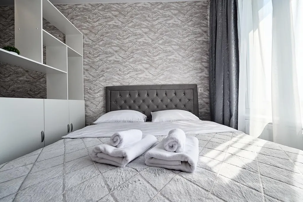 Светлые тёплые апартаменты с видом на горы и город