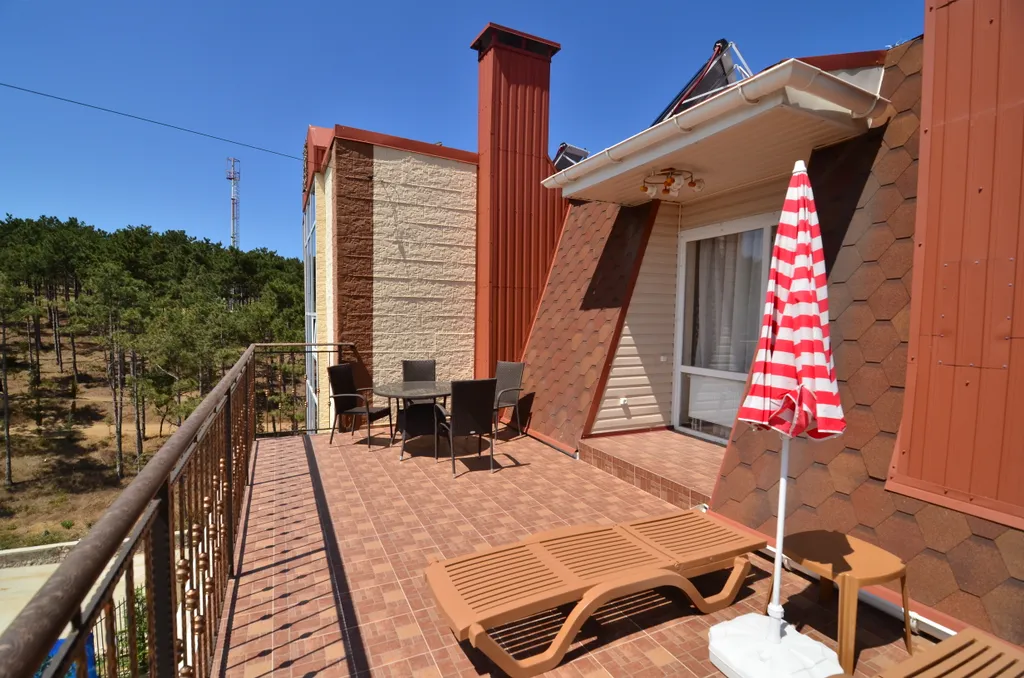 Четырехместный номер категории Люкс с террасой