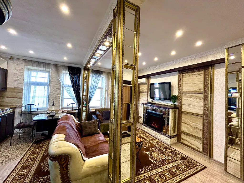 Уютные апартаменты у моря с камином и дизайнерским ремонтом