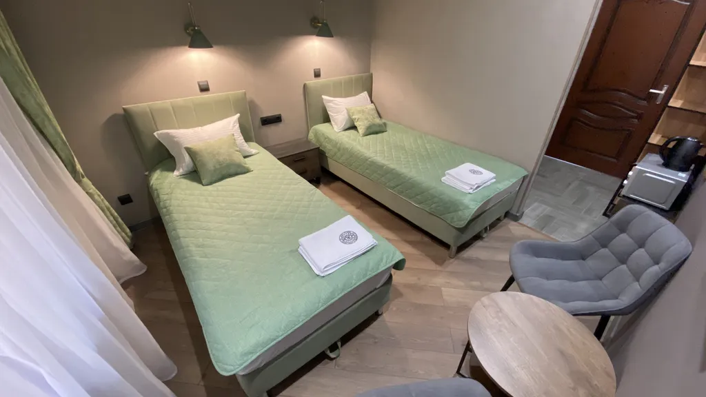 Уютные апартаменты с двумя односпальными кроватями