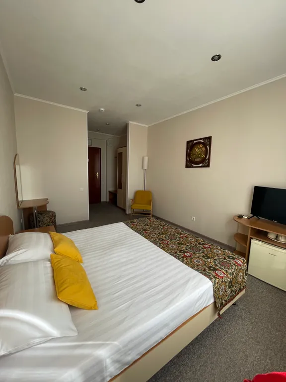 Уютный двухместный номер с двуспальной кроватью и видом на море