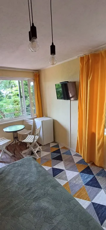 Комната с верандой в доме Остановка Море с видом на море и лес