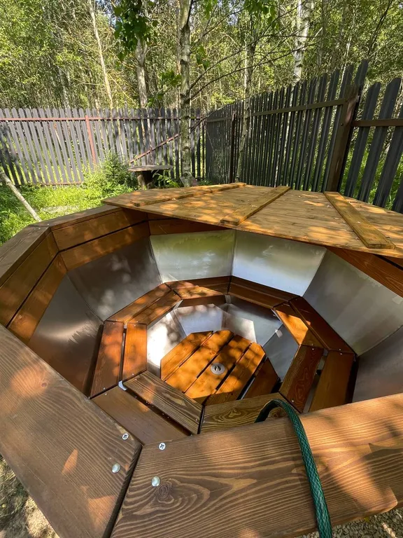 Треугольный дом