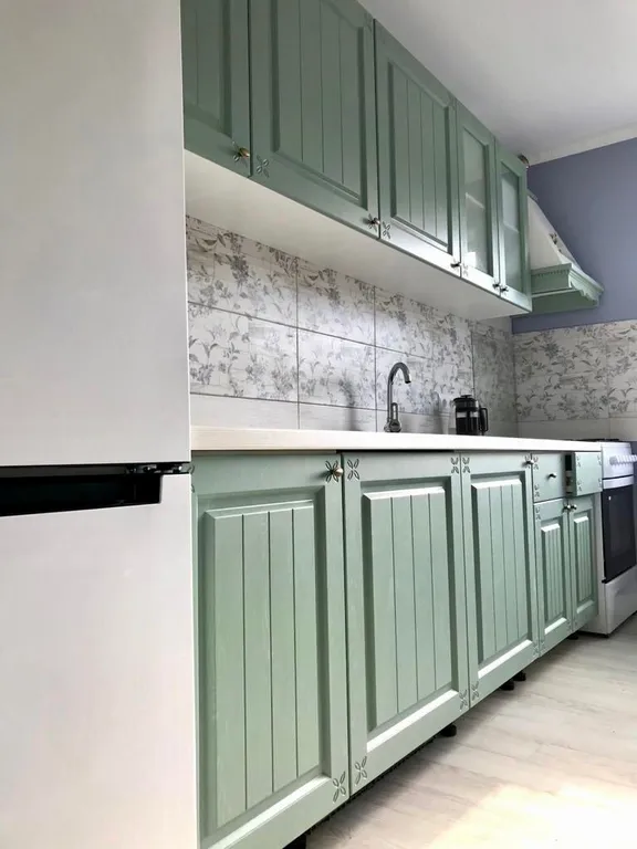 Квартира с зелёной гостиной