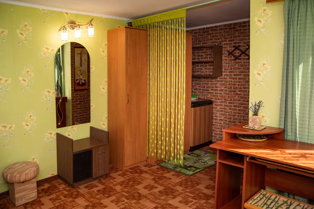 Семейные апартаменты с отдельным уютным двориком