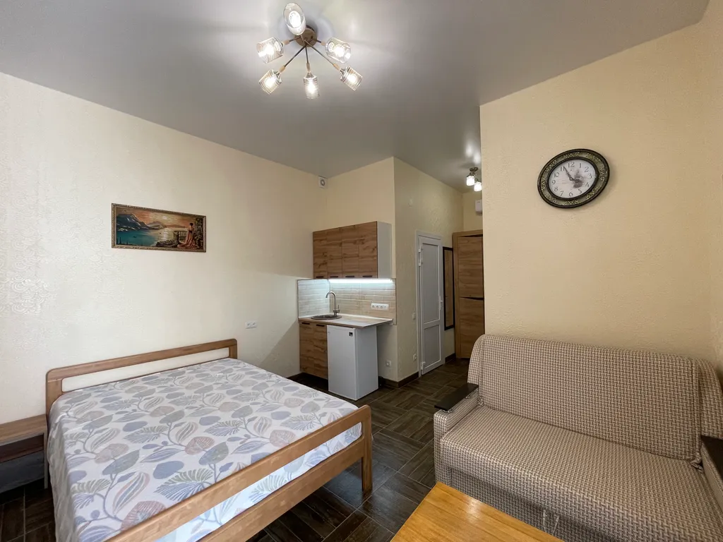 Комфортные апартаменты - студия, с кухней, на первом этаже