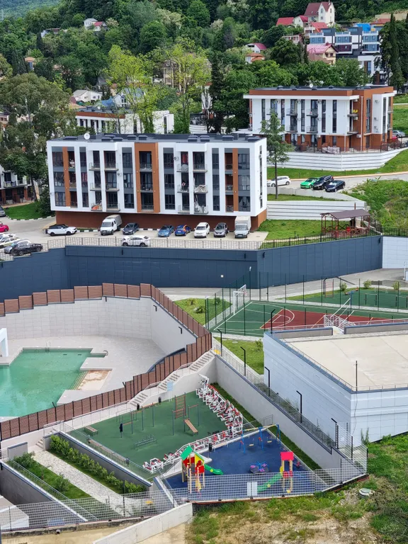 Квартира Квартира Зонированная студия с ванной, видом на море, бассейном на территории — Адлер