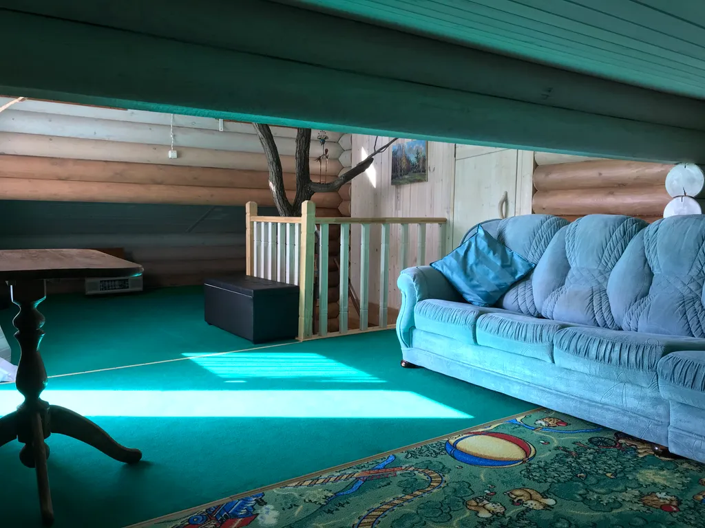 Дом из бревна Терем с сауной в черте города