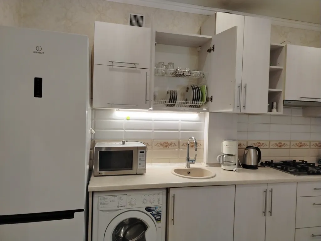 Квартира Уютная квартира на первом этаже в новом доме рядом с Южным парком — Калининград