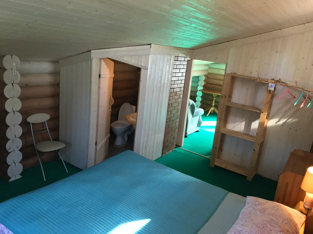 Дом из бревна Терем с сауной в черте города