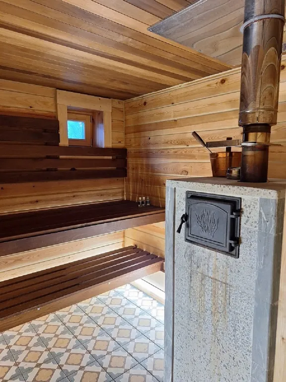 Коттедж на берегу реки в Рощино