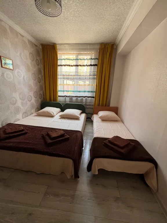 Уютный домик в 7 минутах от моря с зеленым двориком и парковой