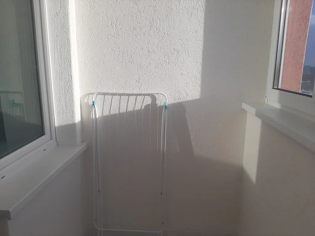 Уютная студия с видом на колесо обозрения