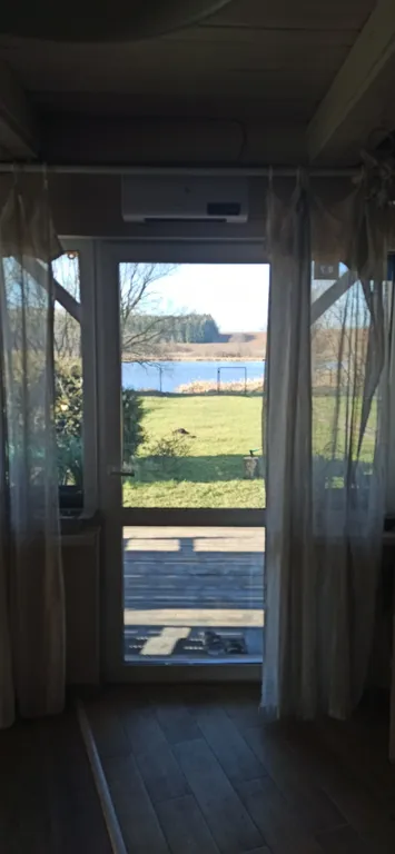 Уютный дом на берегу озера с сауной