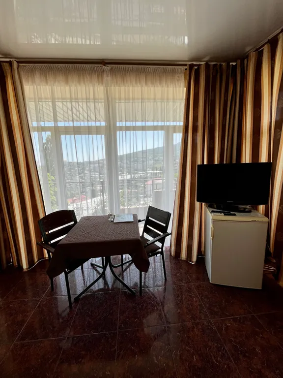 Уютный номер с видом на горы