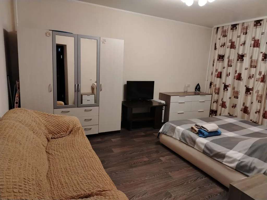 Простор и уют для семьи в центре города с видом на город