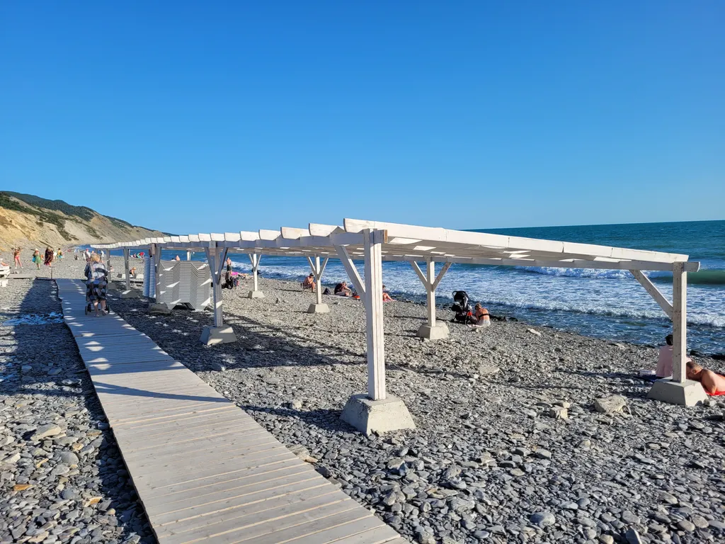 Современная студия у моря с видом на бассейн и горы