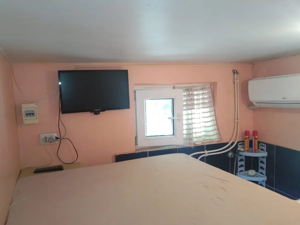 Домик у моря в центре