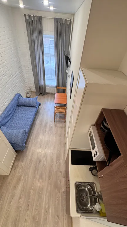 Двухуровневая квартира-студия в центре города