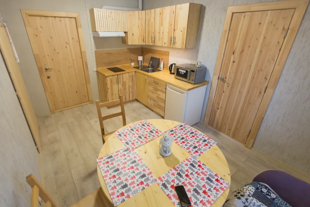 Уютный апартамент с видом на лес и горы.