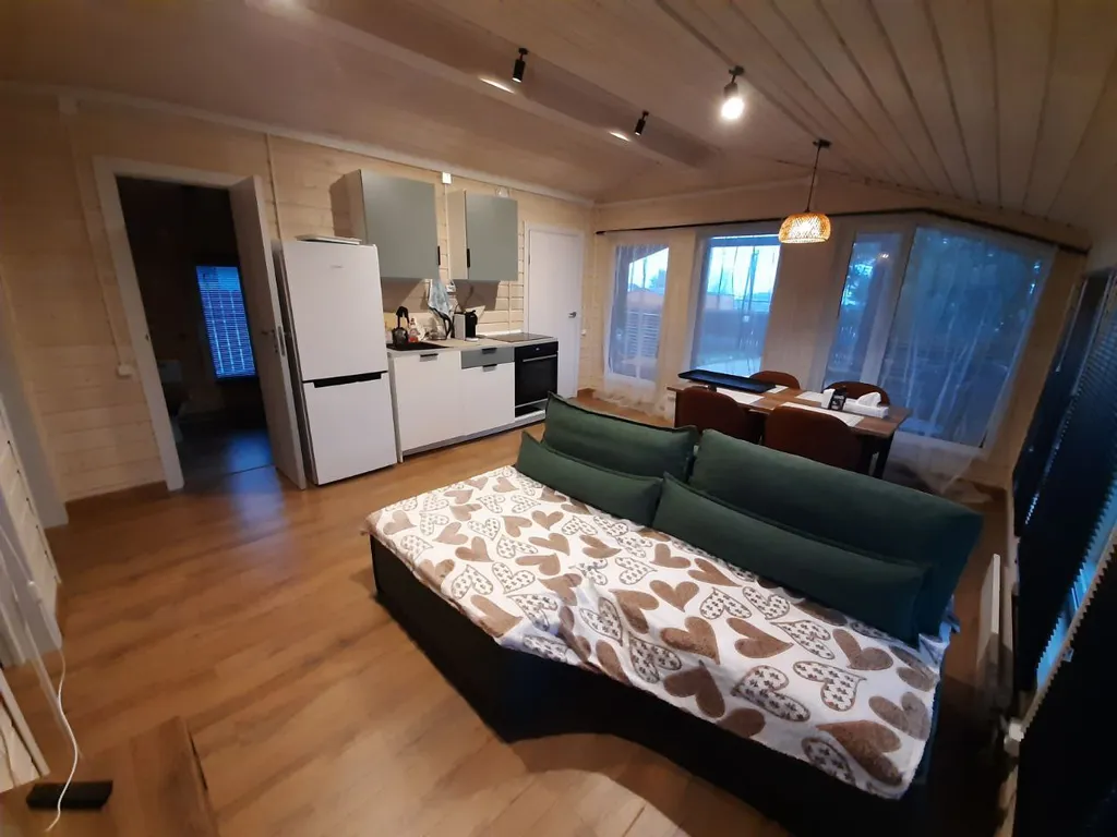 Дом в  соснах.