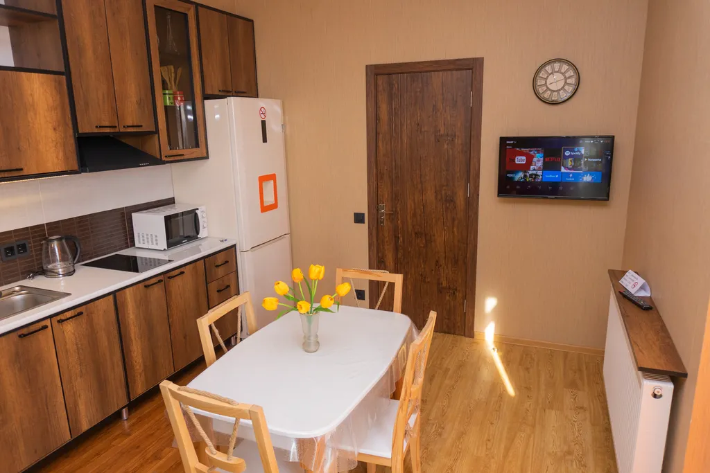 Уютная квартира с большим балконом и видом на город