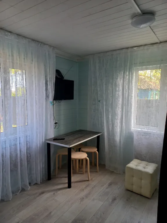 Участок с домом на берегу реки Лагутник