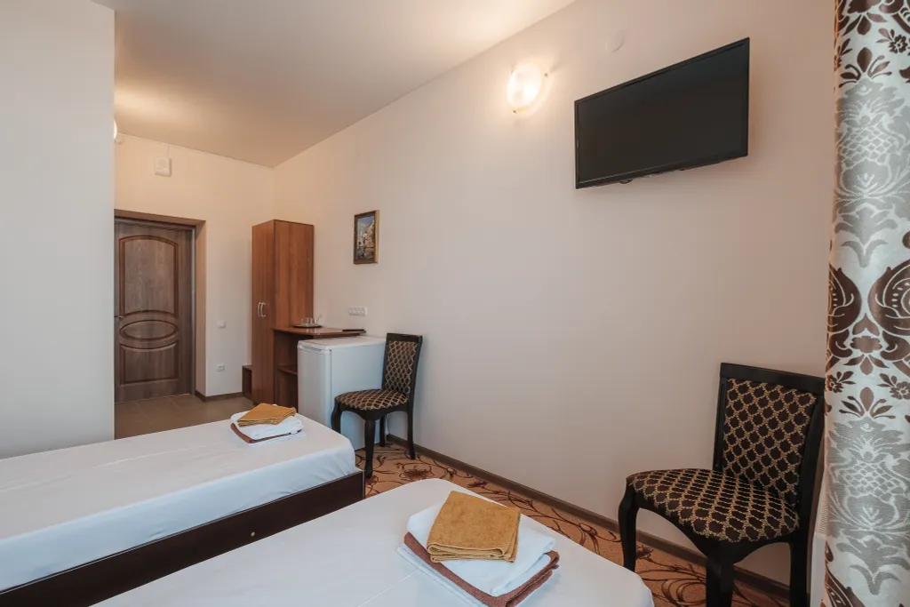 Двухместный номер категории Стандарт с раздельными кроватями