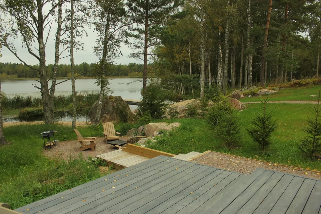 Коттедж Вилла Kaksi с видом на озеро и каменной зоной барбекю — Приозерск