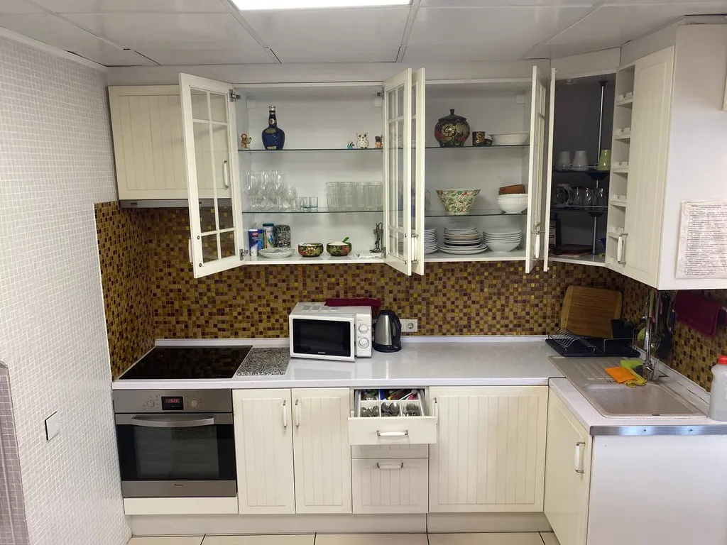 Пятикомнатная квартира с сауной и кинотеатром в центре