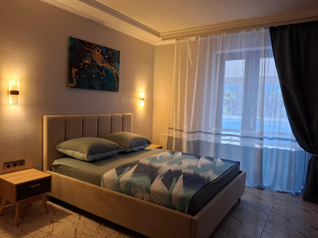 Большой четырёхместный люкс с выходом на бассейн 16