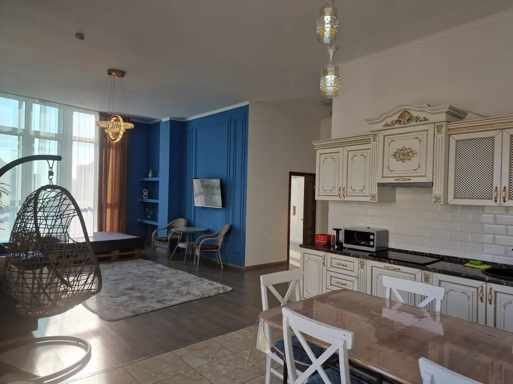 Современные апартаменты с террасой и видом на горы