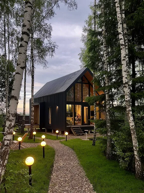 Новый панорамный барнхаус с сауной на лесном участке