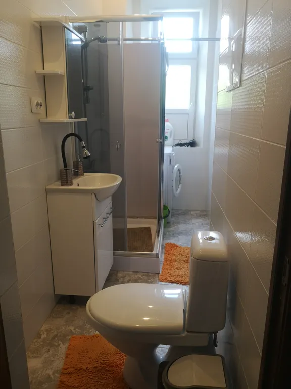 Уютная и теплая квартира в центре города с садом во дворе