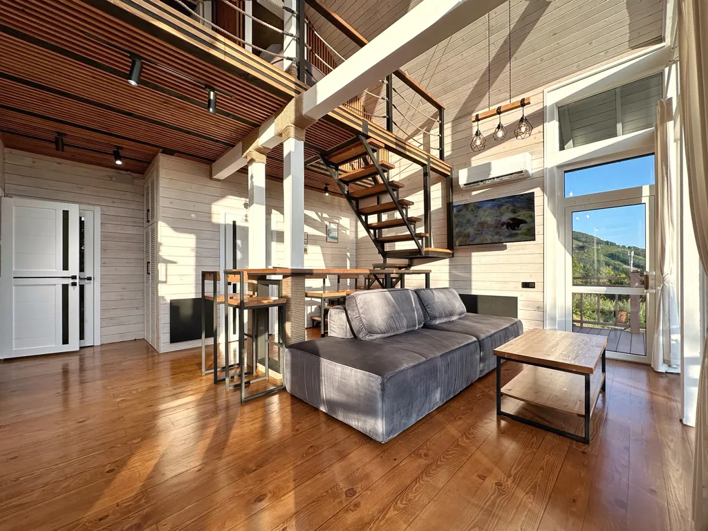 Шале с видом на бухту и вулкан