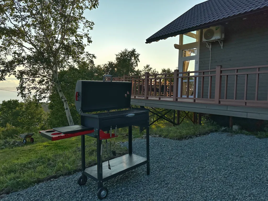 Шале с видом на бухту и вулкан