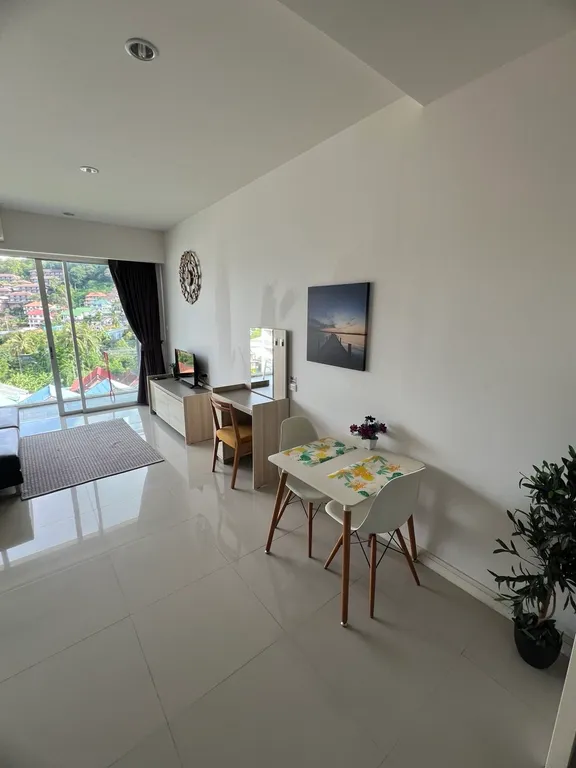 Стильная студия на последнем этаже с потрясающим видом на горы