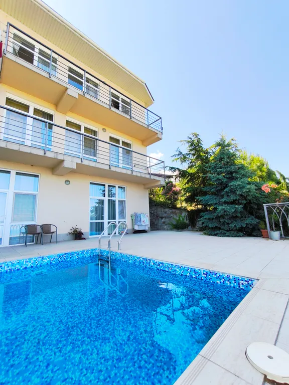 Апартаменты с видом на море и бассейн