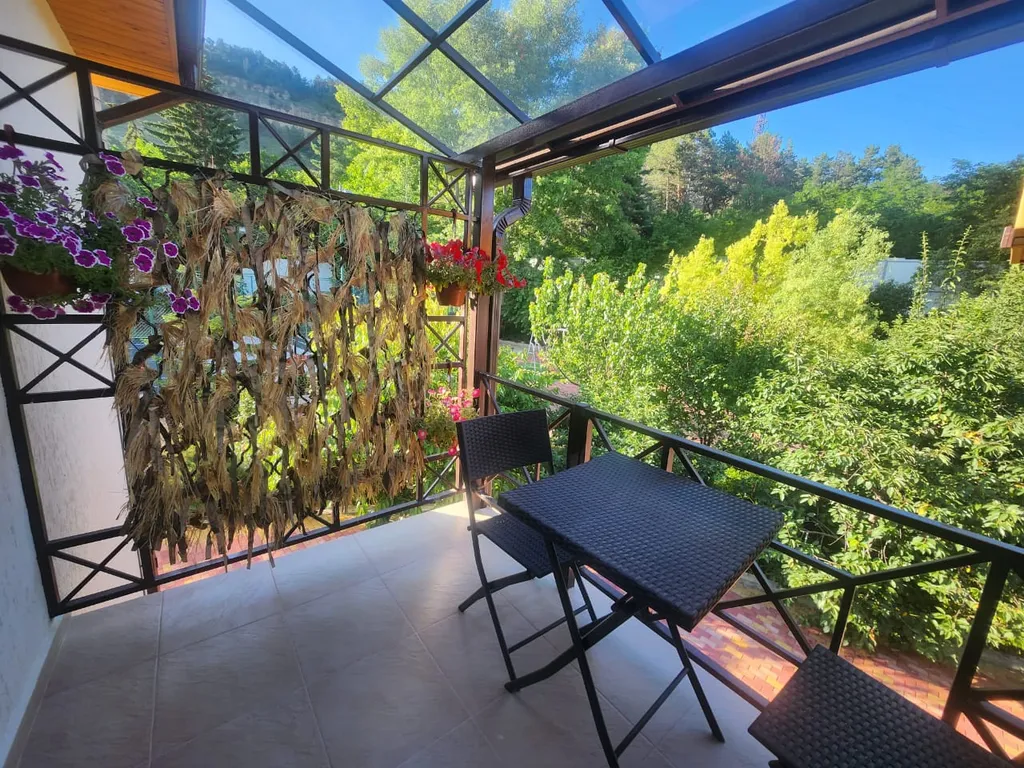 Уютный номер с видом на горы