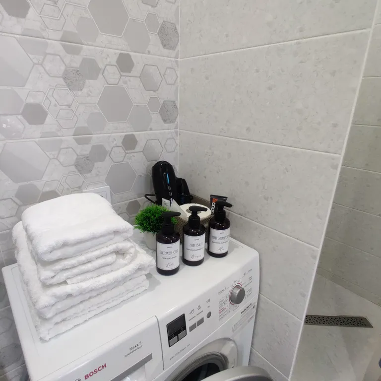 Дизайнерская и просторная квартира недалеко от центра