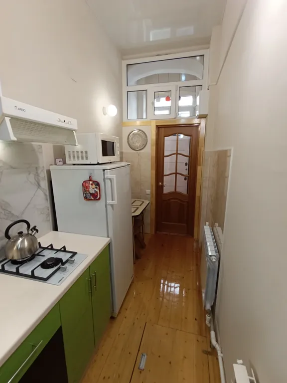 Двухуровневая квартира в центре города с высокими потолками