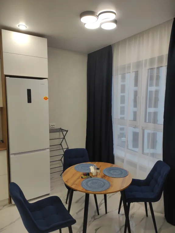 Уютная светлая квартира с видом на город