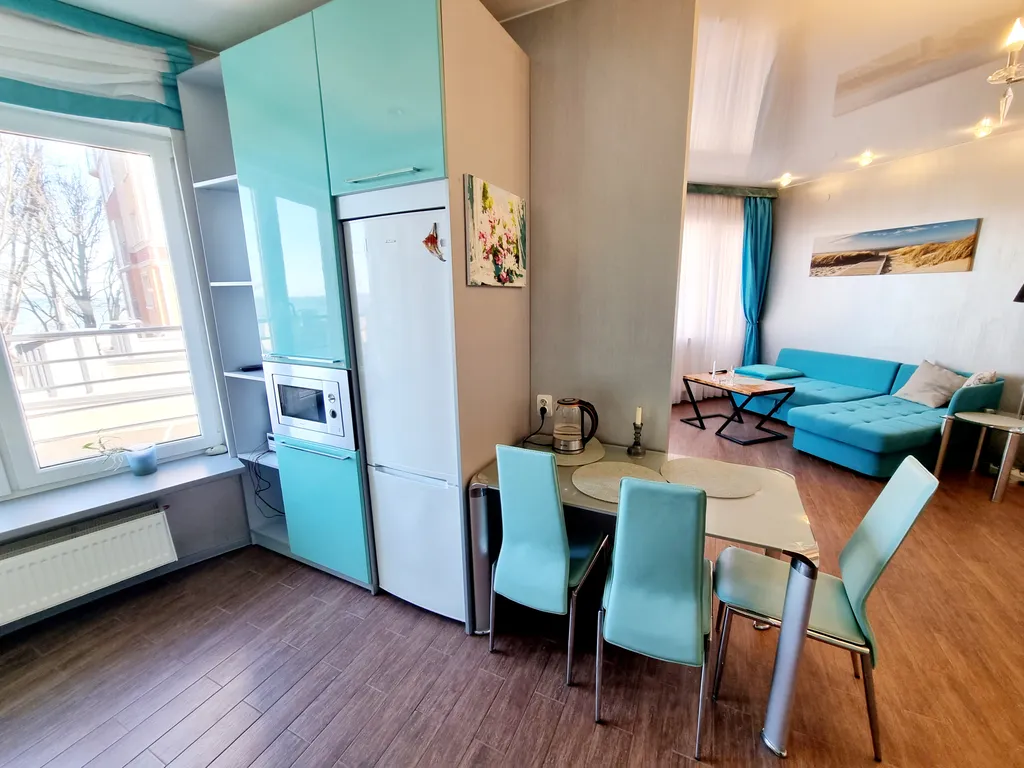 Квартира с большой террасой, видом на море, велосипедами и сапбордами